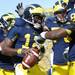 Michigan quarterback Devin Gardner celebrates a touchdown with teammates against Iowa during the second quarter at Michigan Stadium. Melanie Maxwell I AnnArbor.com